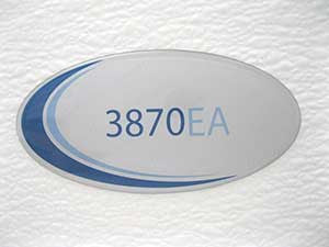    Door Label, Blue Oval, Tuttnauer Autoclave 3870EA Part: LAB048-0235